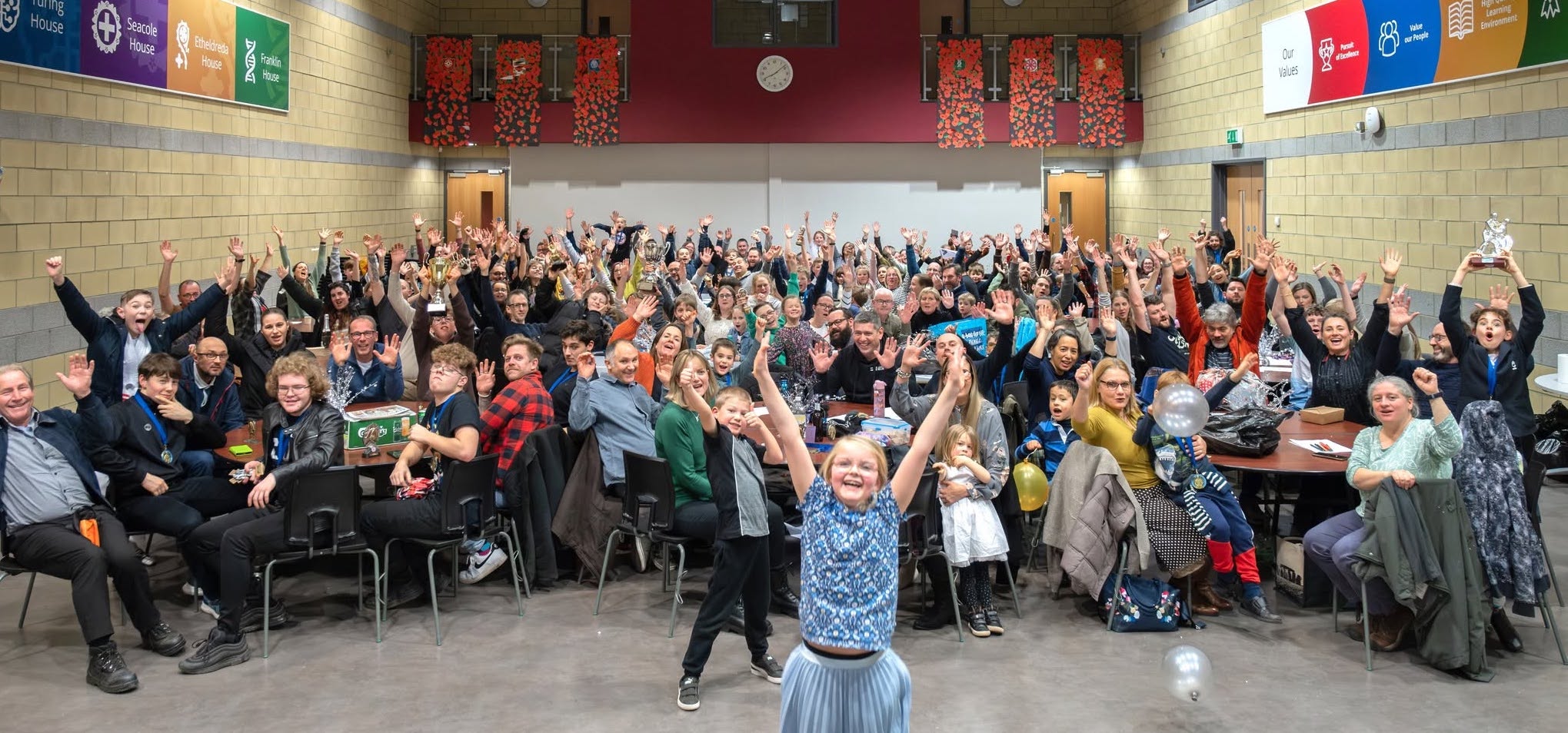 Ely Dojo community celebration — hundreds of members and families
